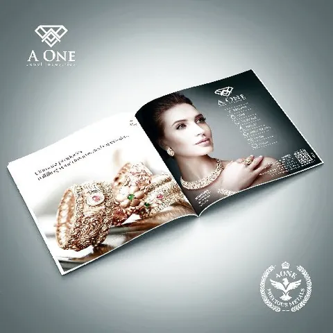 A One brochure spread: gold rings beside a portrait