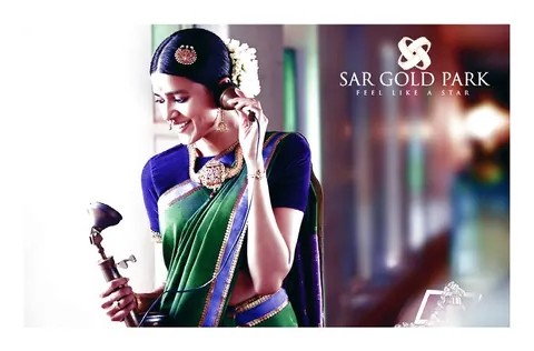 SAR Gold Park campaign photograph of a woman in a silk saree on a vintage telephone