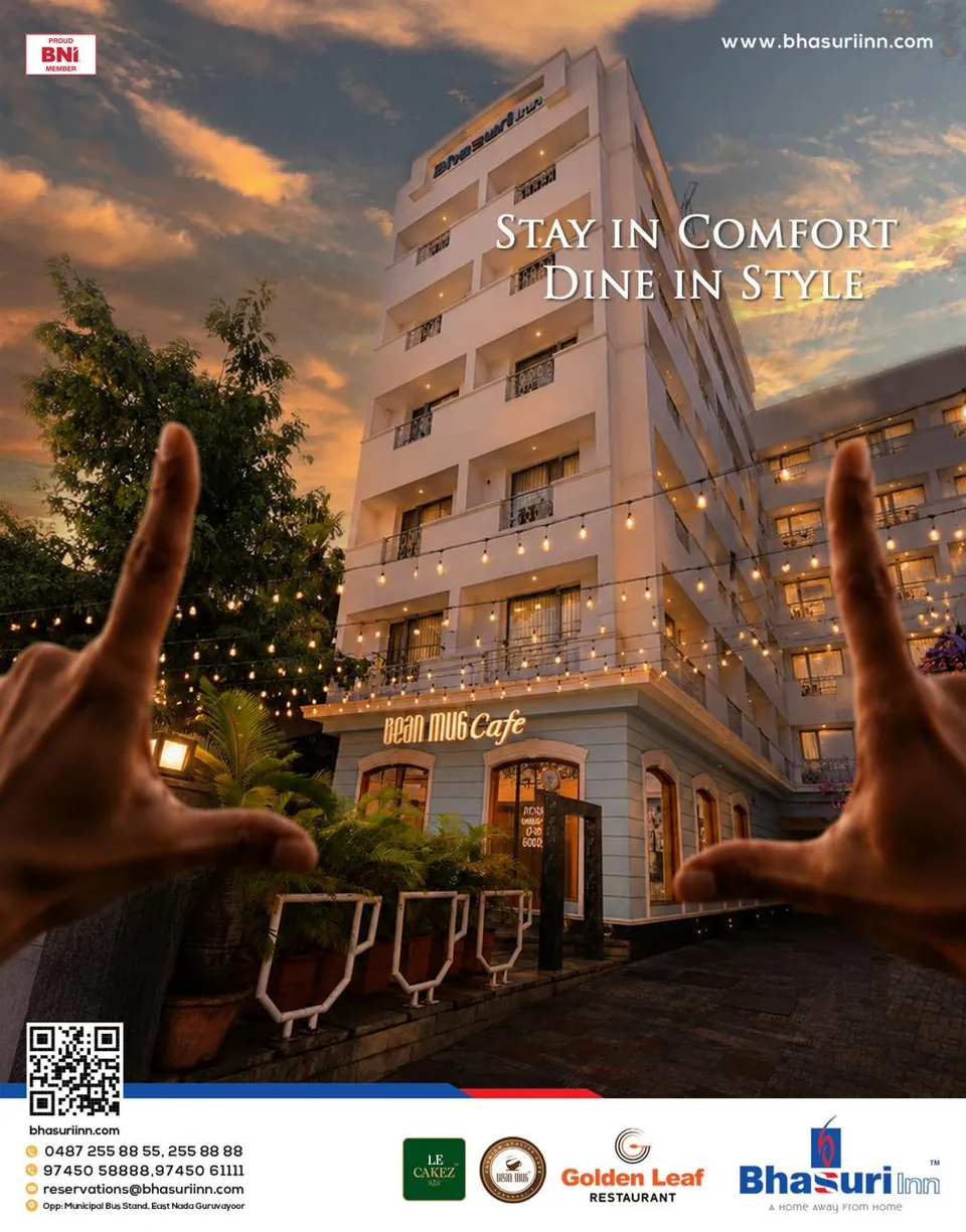 Bhasuri Inn poster: the hotel lit at night, 'Stay in comfort, dine in style'